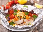 Риба у фользі з овочами