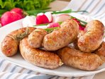 Домашні курячі ковбаски з беконом