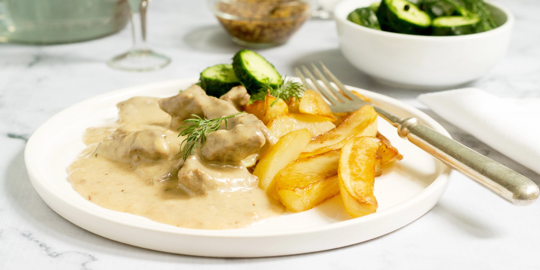 Свинина в сметанно-гірчичному соусі