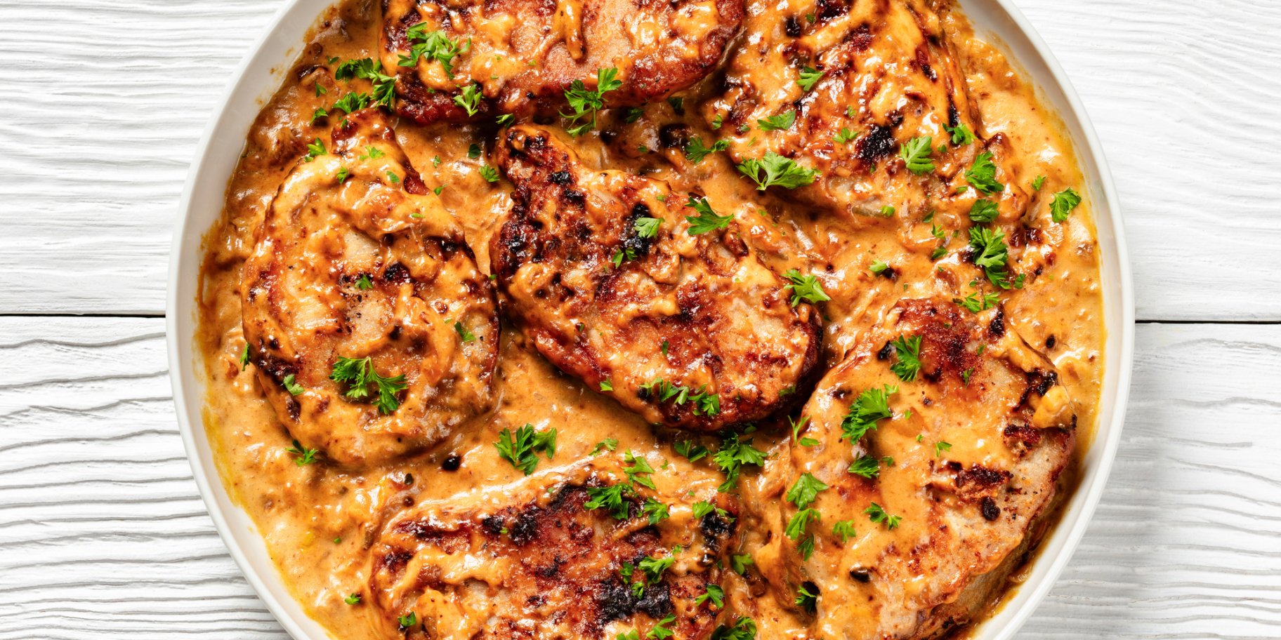 Свинячі відбивні в гострому соусі