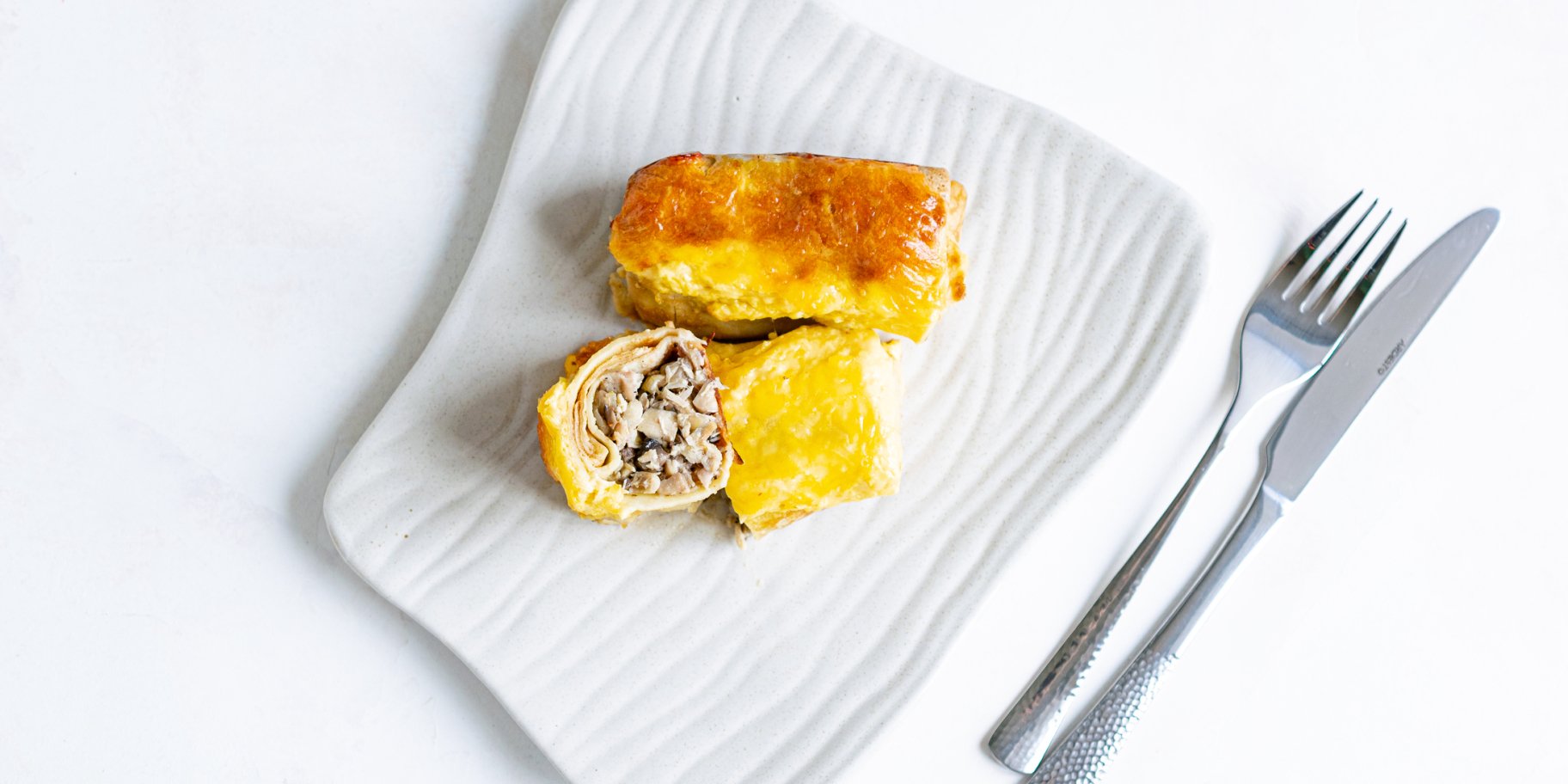 Запечені млинці з куркою та грибами