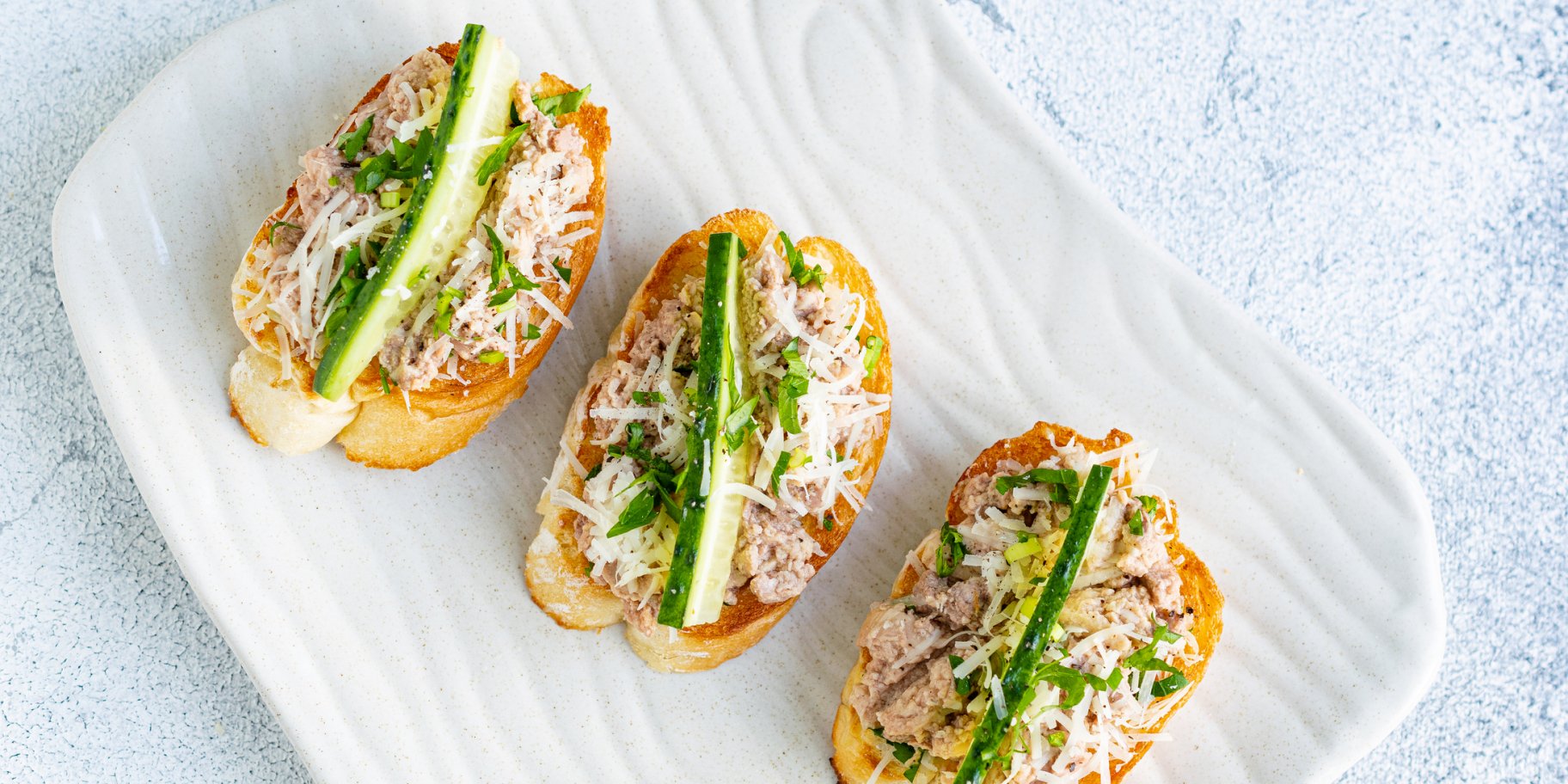 Кростіні з печінкою тріски