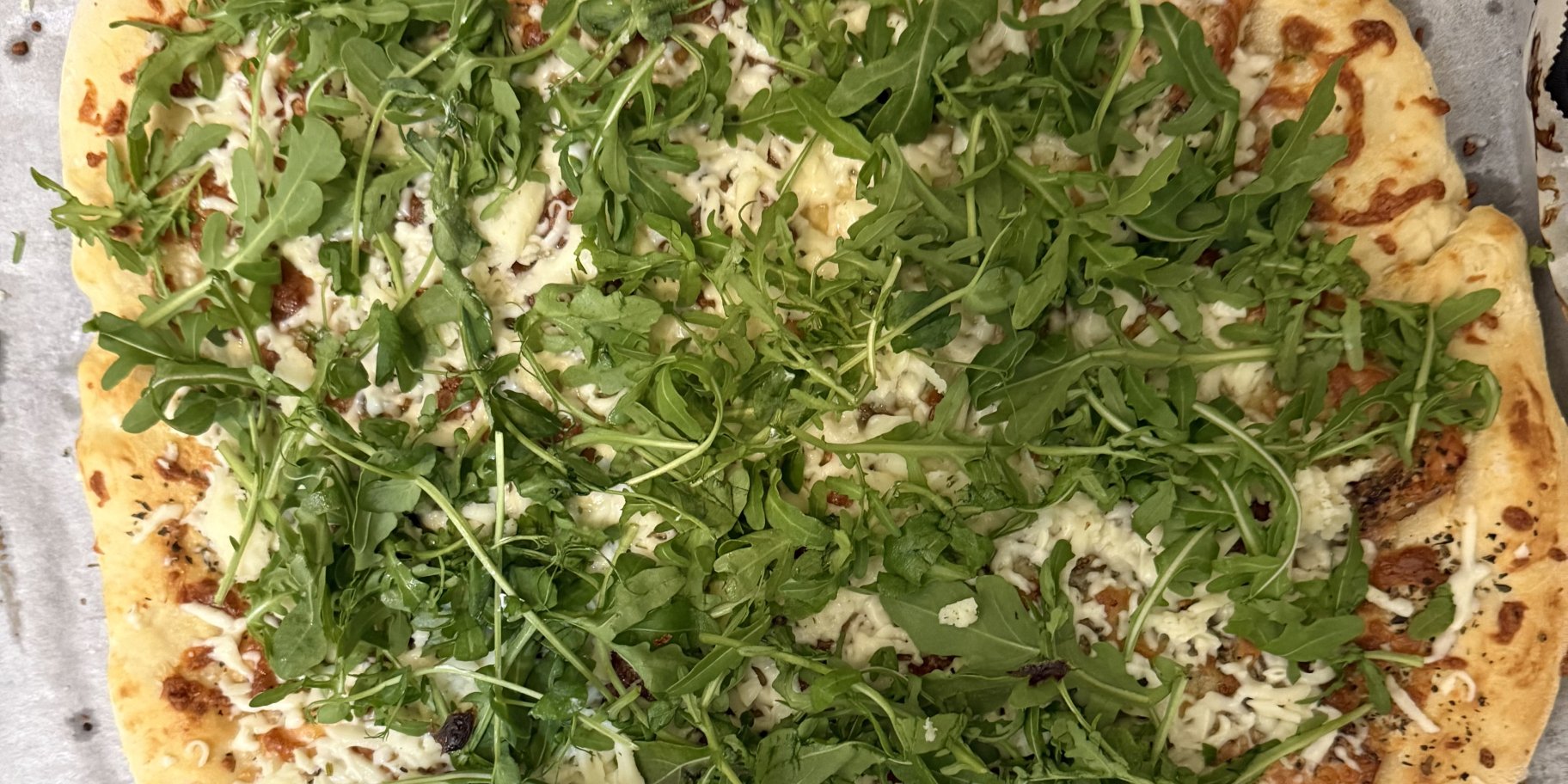 Піца з лососем і руколою