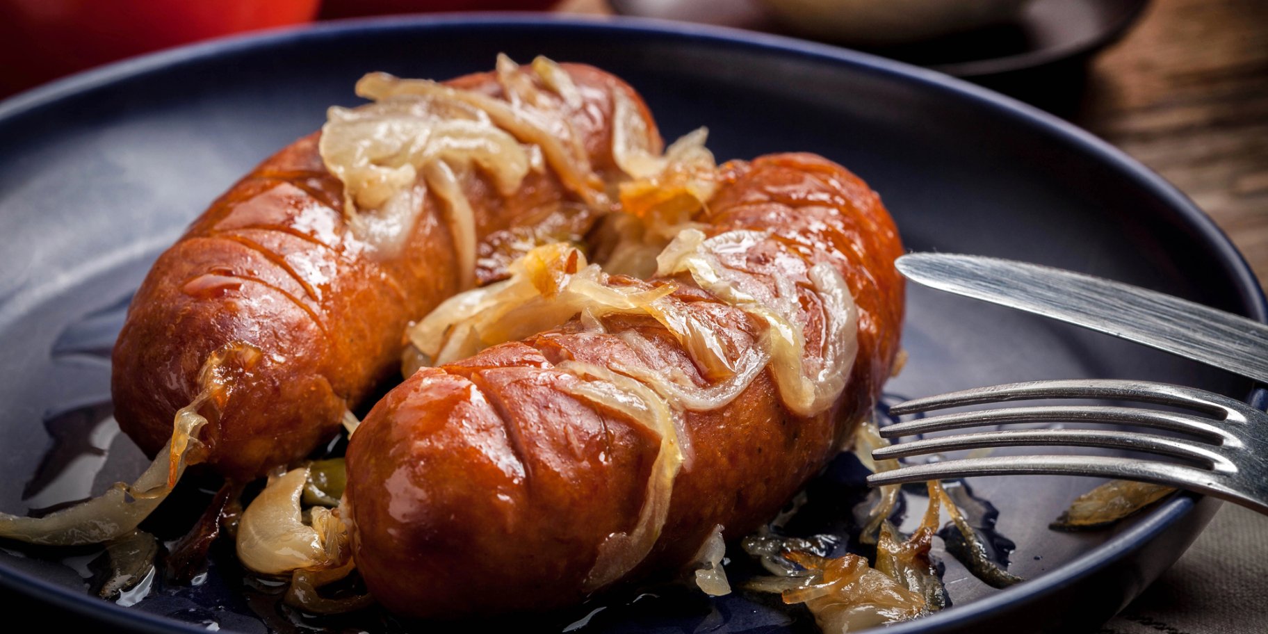 Запечені ковбаски в пиві