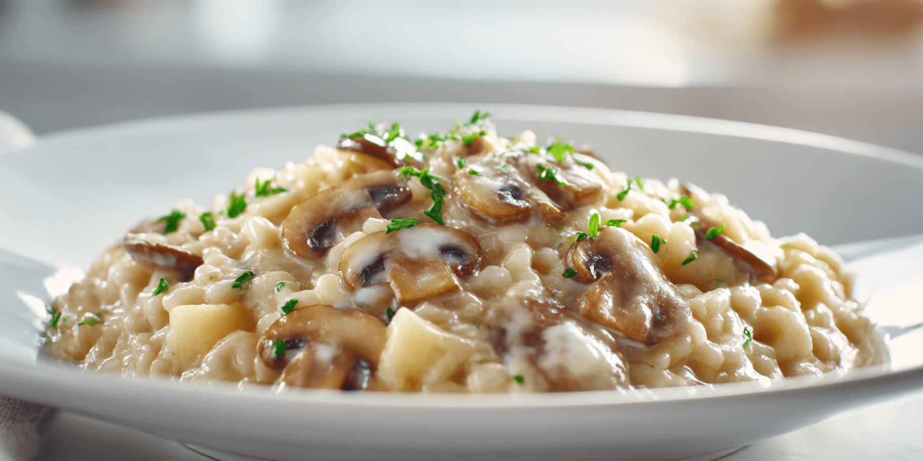 Вершкове ризотто з картоплі та грибів