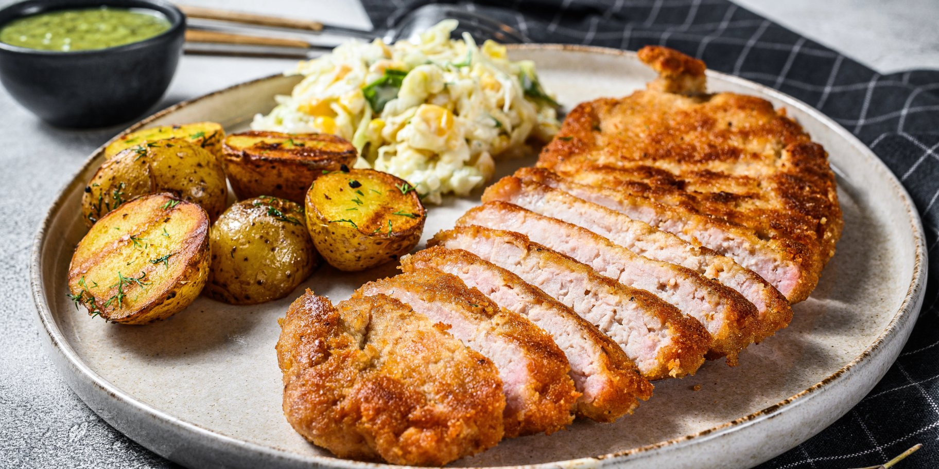 Свинячі відбивні по-швейцарськи