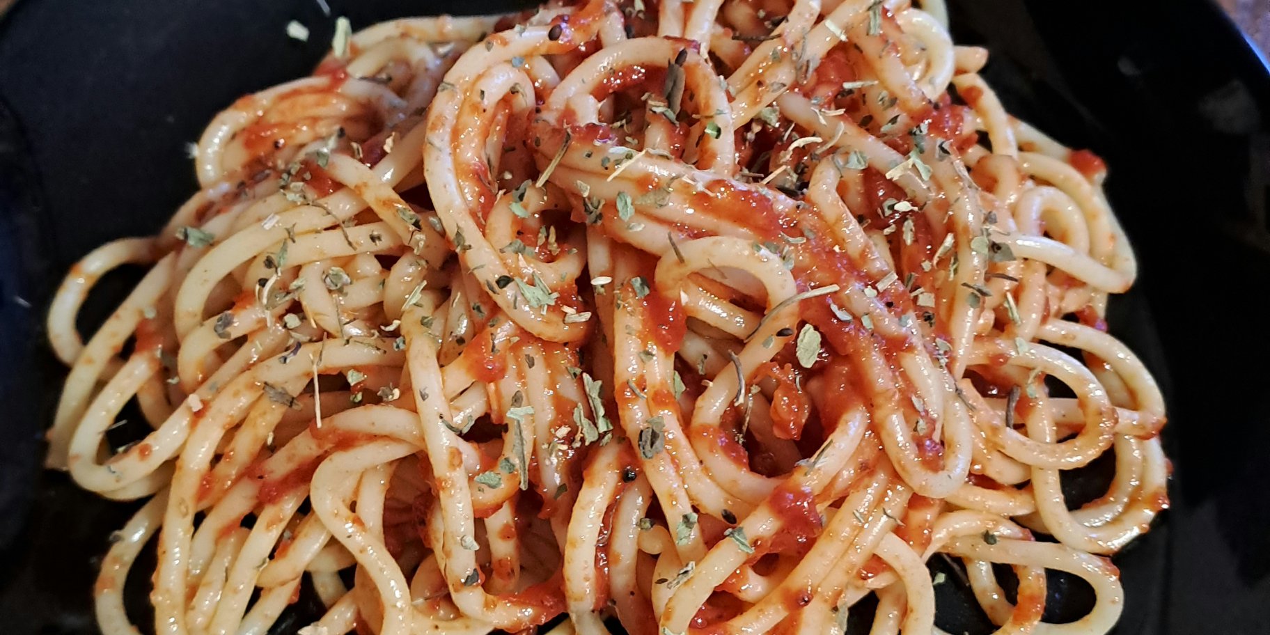 Спагеті із соусом