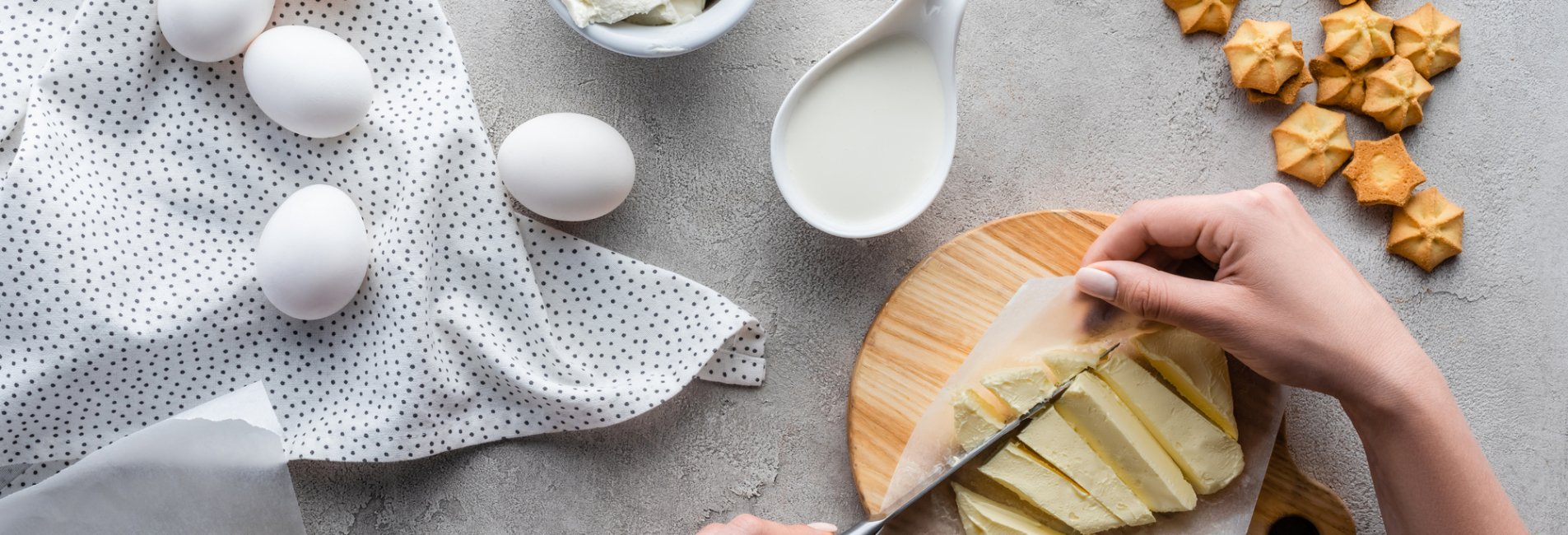 Чем можно заменить выпечку. Woman Cutting Butter.