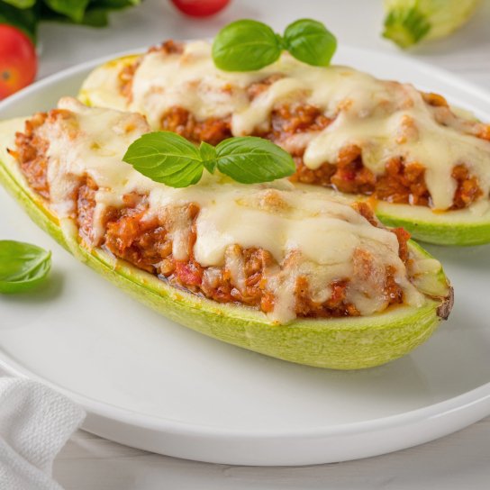 Кабачки з фаршем та сиром
