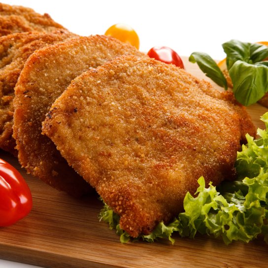 Свинячі відбивні в білковому клярі