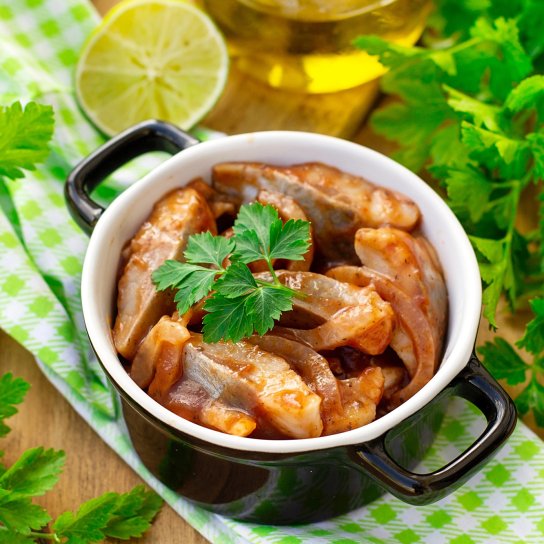 Оселедець у томатному соусі