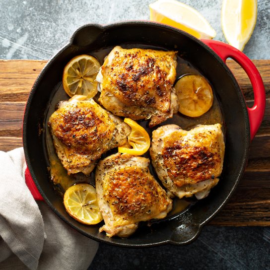 Курячі стегна з мандаринами