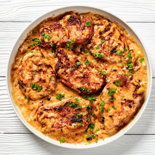 Свинячі відбивні в гострому соусі