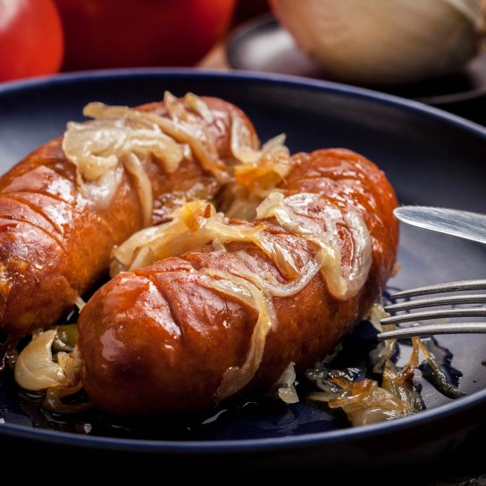 Запечені ковбаски в пиві