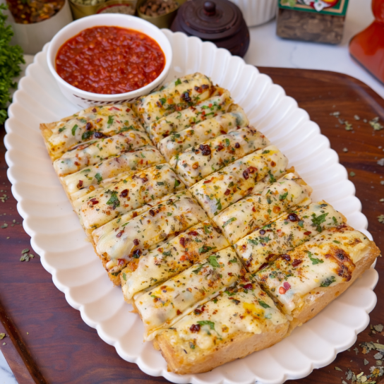 Закуска з розплавленим сиром і часником