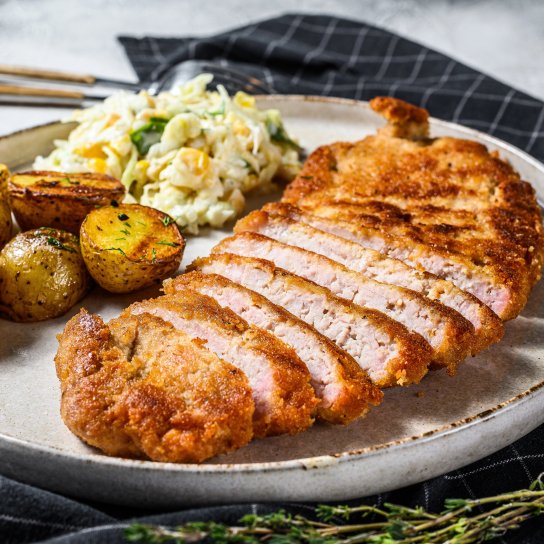 Свинячі відбивні по-швейцарськи