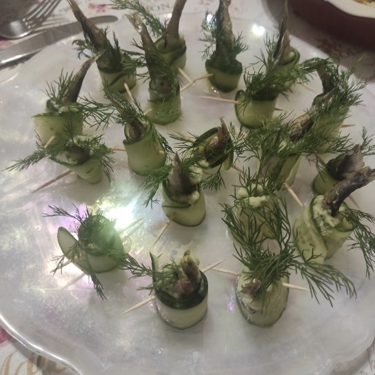 Закуска зі шпротами у рулетиках