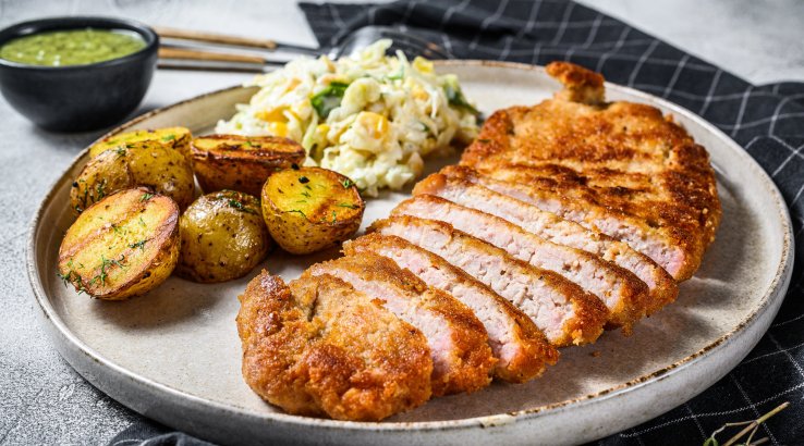 Свинячі відбивні по-швейцарськи