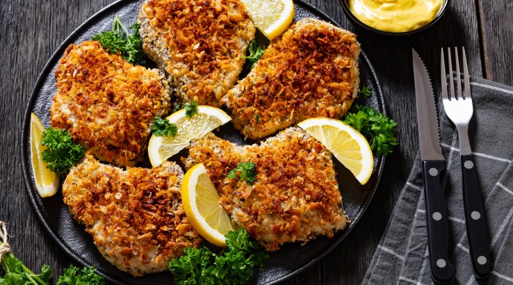 Свинячі відбивні з ананасом